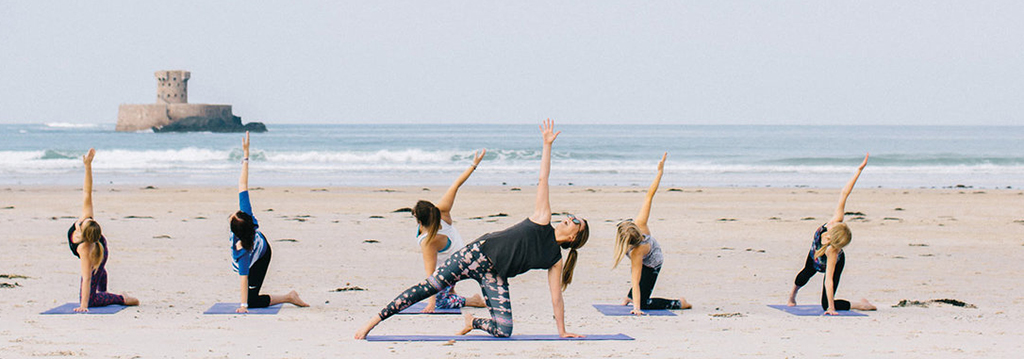 Beach yoga with Vanessa Garrett